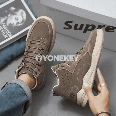 Erkekler üçin ýokary boýunly gyş aýakgaplary, bagjykly stil