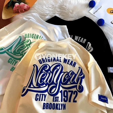 Erkekler üçin giň ölçegli ýumşak futbolka, retro ýazgyly, gündelik stil