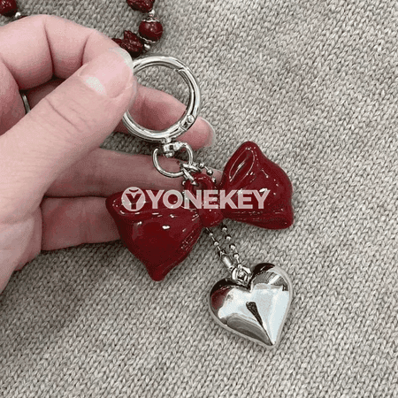 Ýürek we ýaý görnüşli bezegli döredijilikli açar halkasy