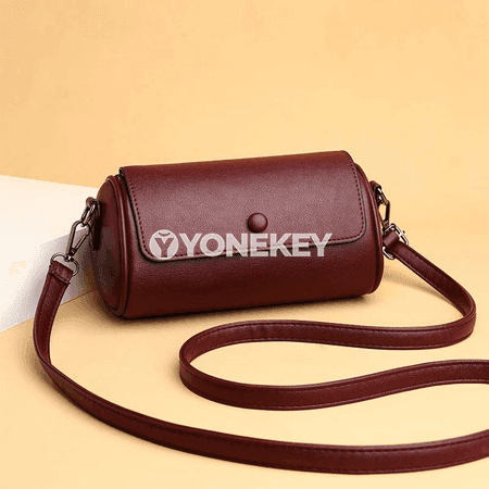 Zenanlar üçin kiçi crossbody sumka — silindr görnüşli, sade stil
