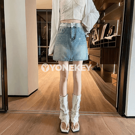 Zenanlar üçin ýokary belli, amaly denim miný yubka