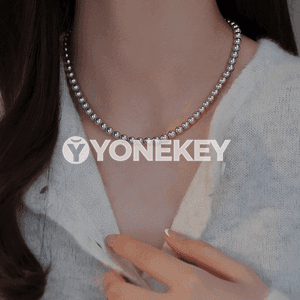 Zenanlar üçin owadan görnüşli merjen monjukly zynjyr.