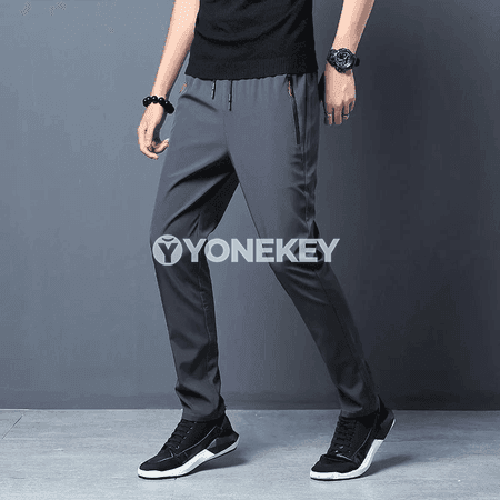 Erkekler üçin sport ýagdaýyndaky zipperli ýeňil jogger balak