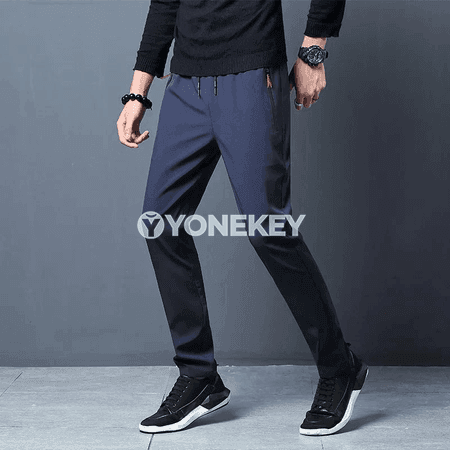 Erkekler üçin sport ýagdaýyndaky zipperli ýeňil jogger balak