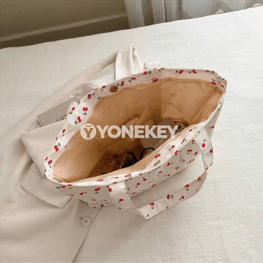 Zenanlar üçin uly sygymly gülli nylon egin sumkasy