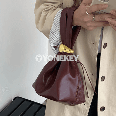 Zenanlar üçin kiçi pu deriden bukulan clutch sumka