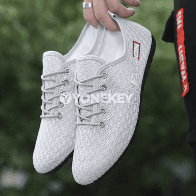 Erkekler üçin tomuslyk dem alýan mesh sport köwüşleri