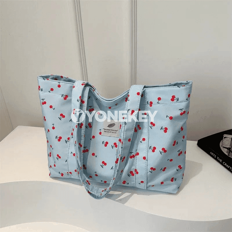 Zenanlar üçin uly sygymly gülli nylon egin sumkasy