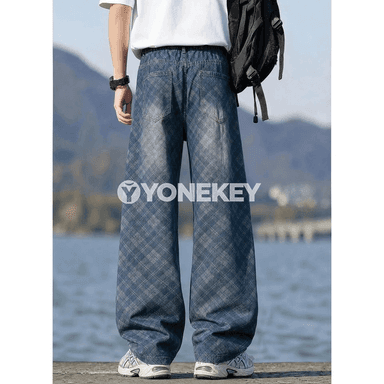 Erkekleriň giň kesimli ýokary belli baggy denim jalbarlary