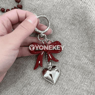 Ýürek we ýaý görnüşli bezegli döredijilikli açar halkasy