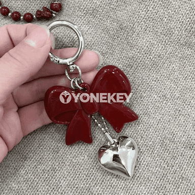 Ýürek we ýaý görnüşli bezegli döredijilikli açar halkasy