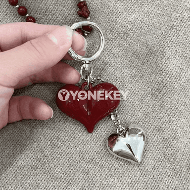 Ýürek we ýaý görnüşli bezegli döredijilikli açar halkasy