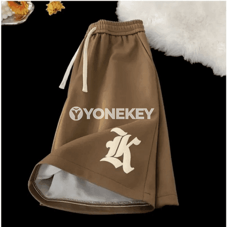 Erkekler üçin giň kesimli 8XL retro grafika çaply köçe şorty